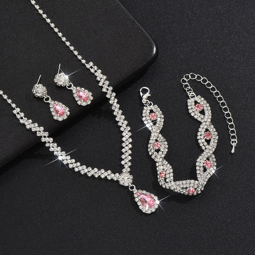 Tropfenpendant und passendes Tropfohrschmuckset für Braut mit kubischem Zirkonia-Halo
