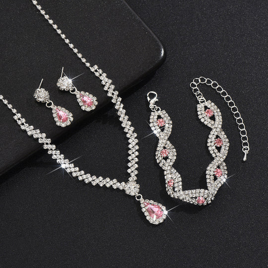 Tropfenpendant und passendes Tropfohrschmuckset für Braut mit kubischem Zirkonia-Halo