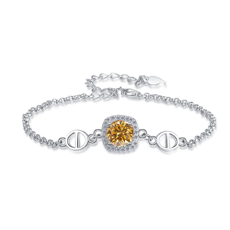 Damenarmband mit strahlend gelbem Kristall und funkelndem Zirkonia-Rahmen Shop Nory