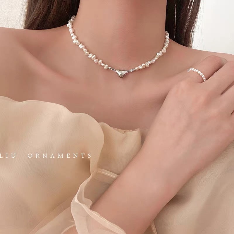 Damen Armband mit handgefertigten Perlen und herzförmigem Anhänger Shop Nory