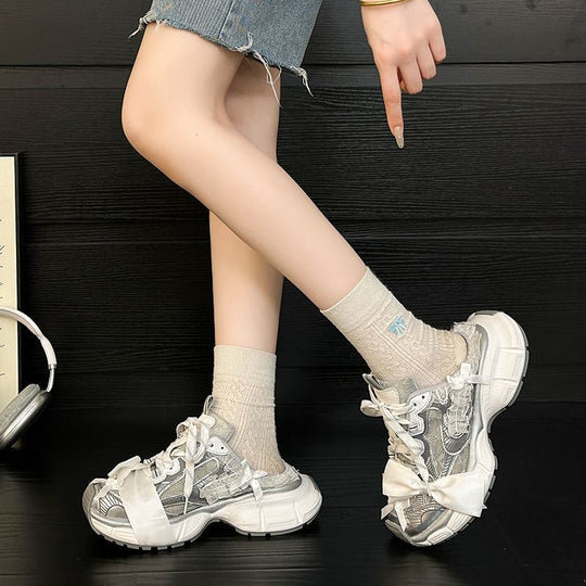 Damen Chunky‑Sneaker mit floraler Spitze und Satin‑Schleife Shop Nory