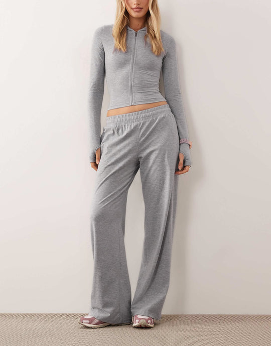 Damen Zweiteiliges Loungewear-Set geripptes Crop-Kapuzenoberteil mit Reißverschluss und Daumenloch sowie weiter Jogginghose Shop Nory