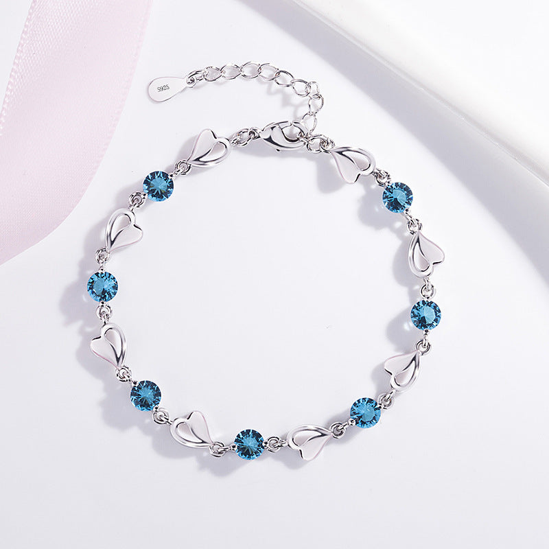 Damen Armband mit funkelnden Herz- und Zirkonia-Elementen Shop Nory