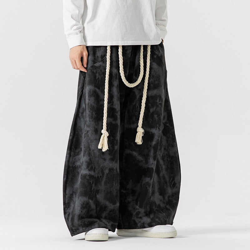 Unisex weite Batik-Haremshose mit dekorativem Kordelbund und tiefem Schritt Shop Nory
