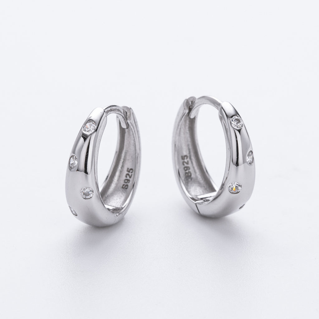 Damen Creolen mit geschwungenem Design und Zirkonbesatz Shop Nory