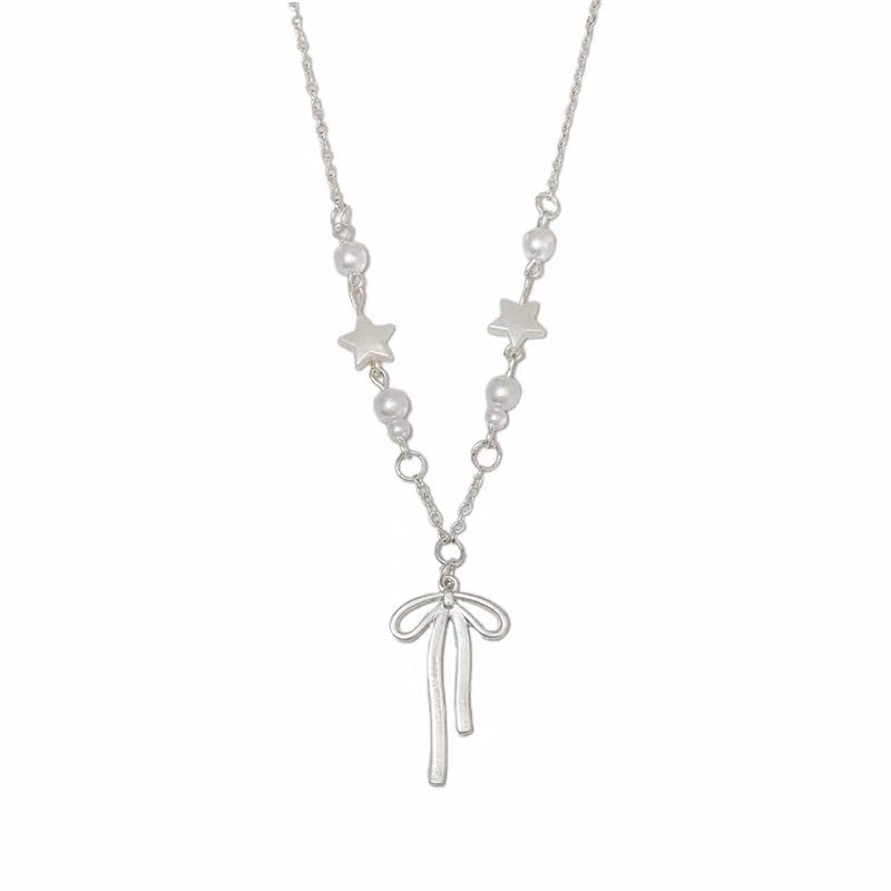 Damen Halskette mit verspieltem Schleifen-Design und Perlendetails Shop Nory