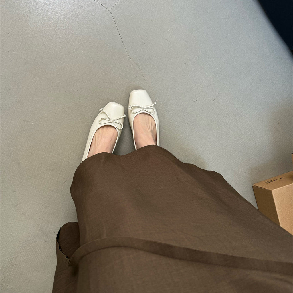 Damen klassisch geschnittene Ballerinas mit zierlichem Schleifenakzent und komfortabler Fußbettung