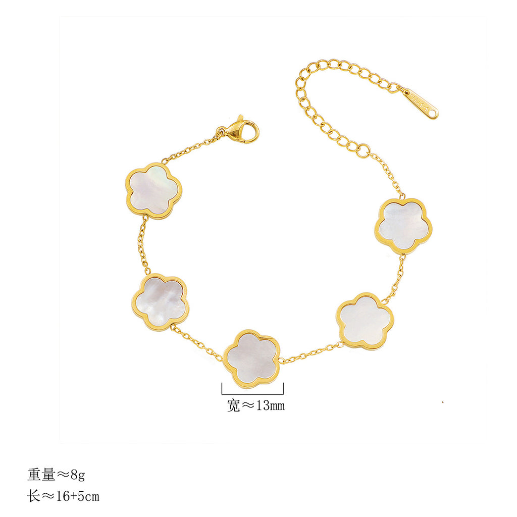 Damen zarte Armbanduhr mit floralem Design und hochwertigen Perlmutt-Elementen Shop Nory