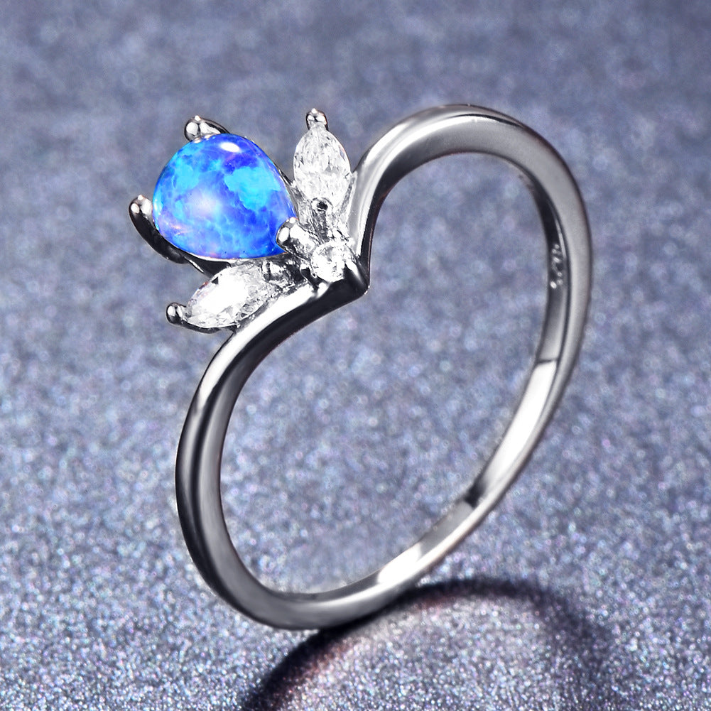 Damen Ring mit elegantem tropfenförmigem Opal und funkelnden Zirkonia Shop Nory