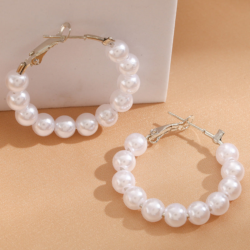 Damen Creolen mit luxuriösen Perlen und goldenen Akzenten Shop Nory