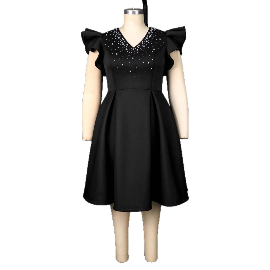 Damen A-Linien Kleid mit glitzernden Perlen und voluminösen Ärmeln