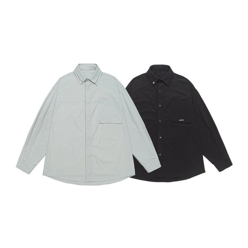 Unisex Oversize Hemd mit technischem Material, Brustklappe und gerundetem Saum Shop Nory