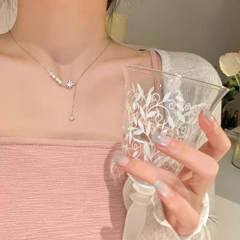 Damen funkelnde Handkette mit Perlen und Sternen Anhänger Shop Nory