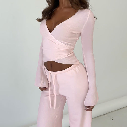 Damen nan Wickel-Cropped-Top mit tiefem V‑Ausschnitt, taillierter Wickelform und langen Glockenärmeln Shop Nory