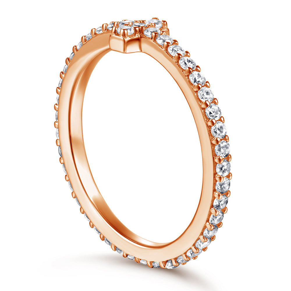 Damen Ring mit funkelndem Zirkonia-Besatz und stilvollem Kreuz-Design Shop Nory