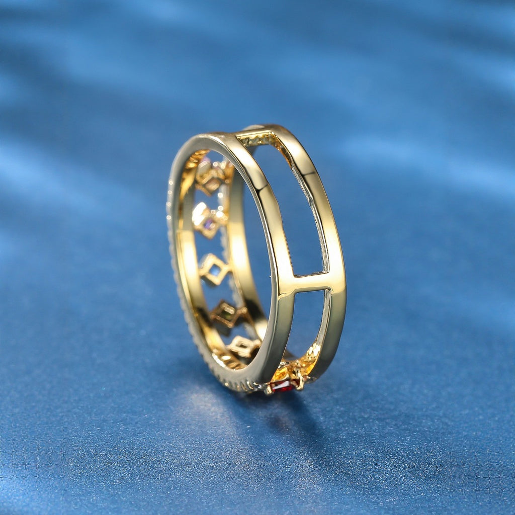 Damen Ring mit funkelnden, farbigen Zirkonia und eleganter Goldfassung Shop Nory