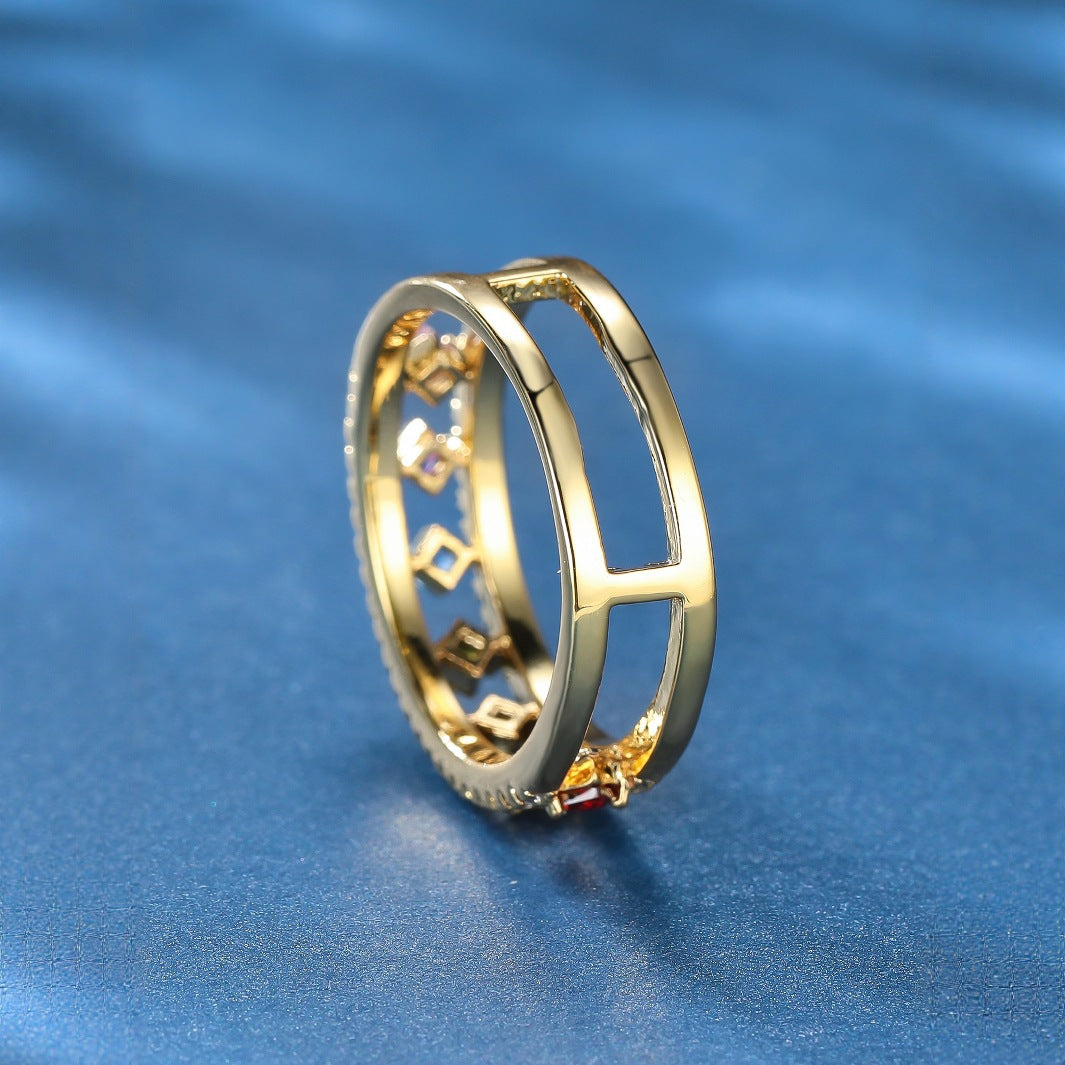 Damen Ring mit funkelnden, farbigen Zirkonia und eleganter Goldfassung Shop Nory