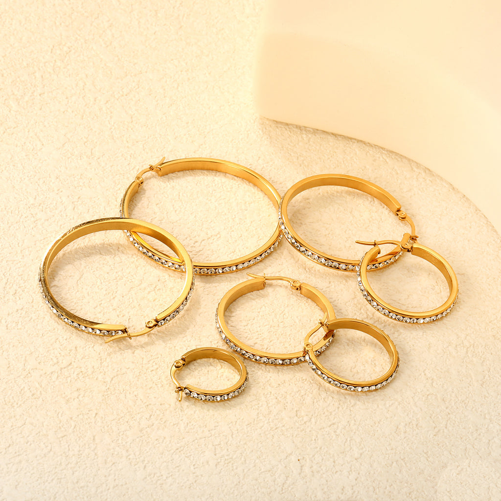 Damen Creolen mit funkelnden Kristallen und hochwertiger Goldbeschichtung Shop Nory