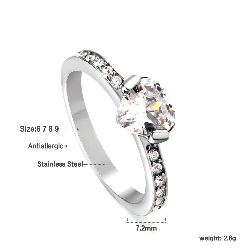 Damen Ring mit brillantem Zirkonia und eleganter Edelstahlfassung Shop Nory