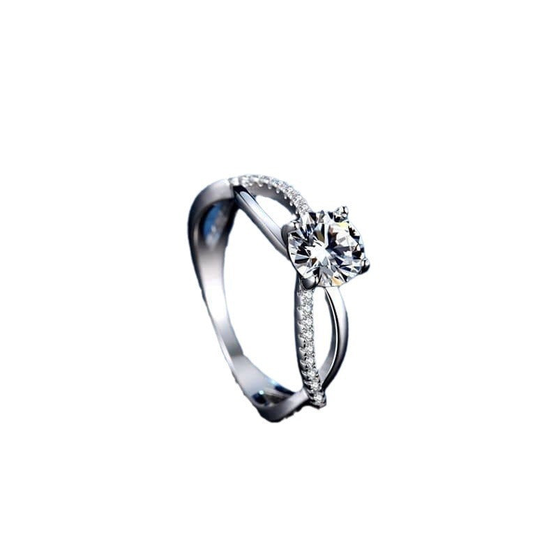 Damen eleganter Schmuckring mit strahlendem Zirkonia und raffinierter Wellenfassung Shop Nory