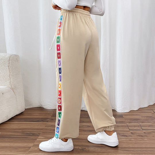 Damen Locker sitzende Jogginghose mit Gummibund, Tunnelzug und bunten Seitenstreifen Shop Nory