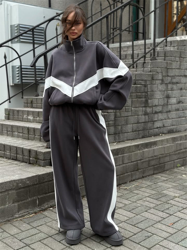 Damen eleganter sportlicher Zweiteiler Trainingsanzug mit Reißverschluss und kontrastierender V-Passe Shop Nory