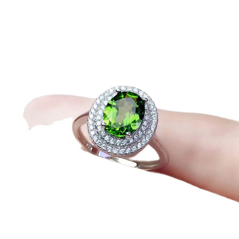 Damen Zierlicher Ring mit ovalem, strahlendem Edelstein und funkelndem Zirkonia-Besatz Shop Nory