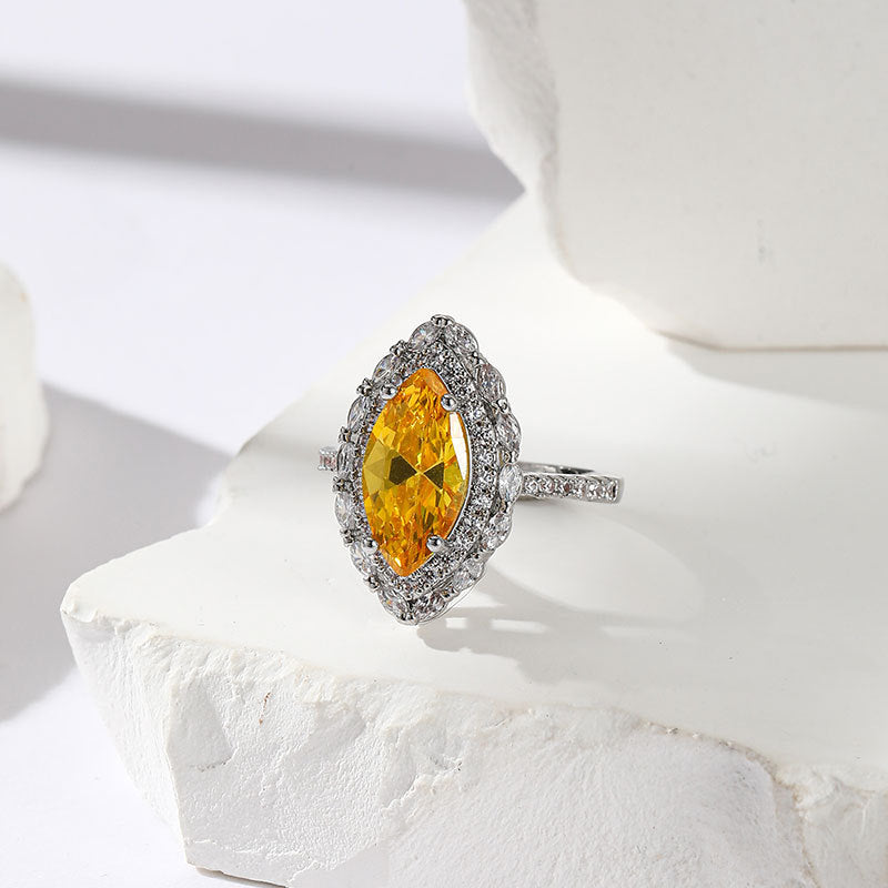 Damen eleganter und funkelnder Ring mit gelbem Zirkonia Shop Nory