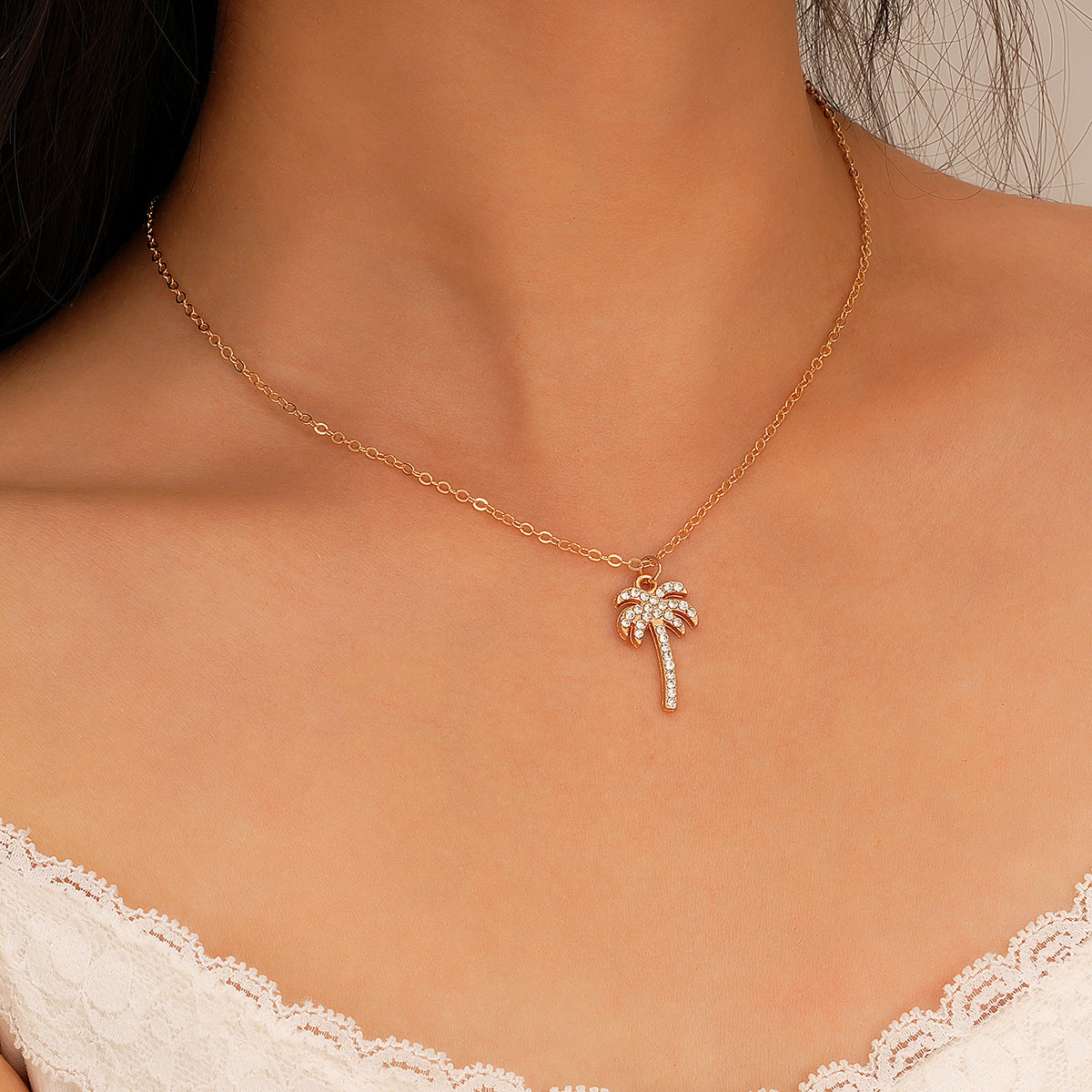 Damen Halskette mit glitzerndem Palmenanhänger Shop Nory