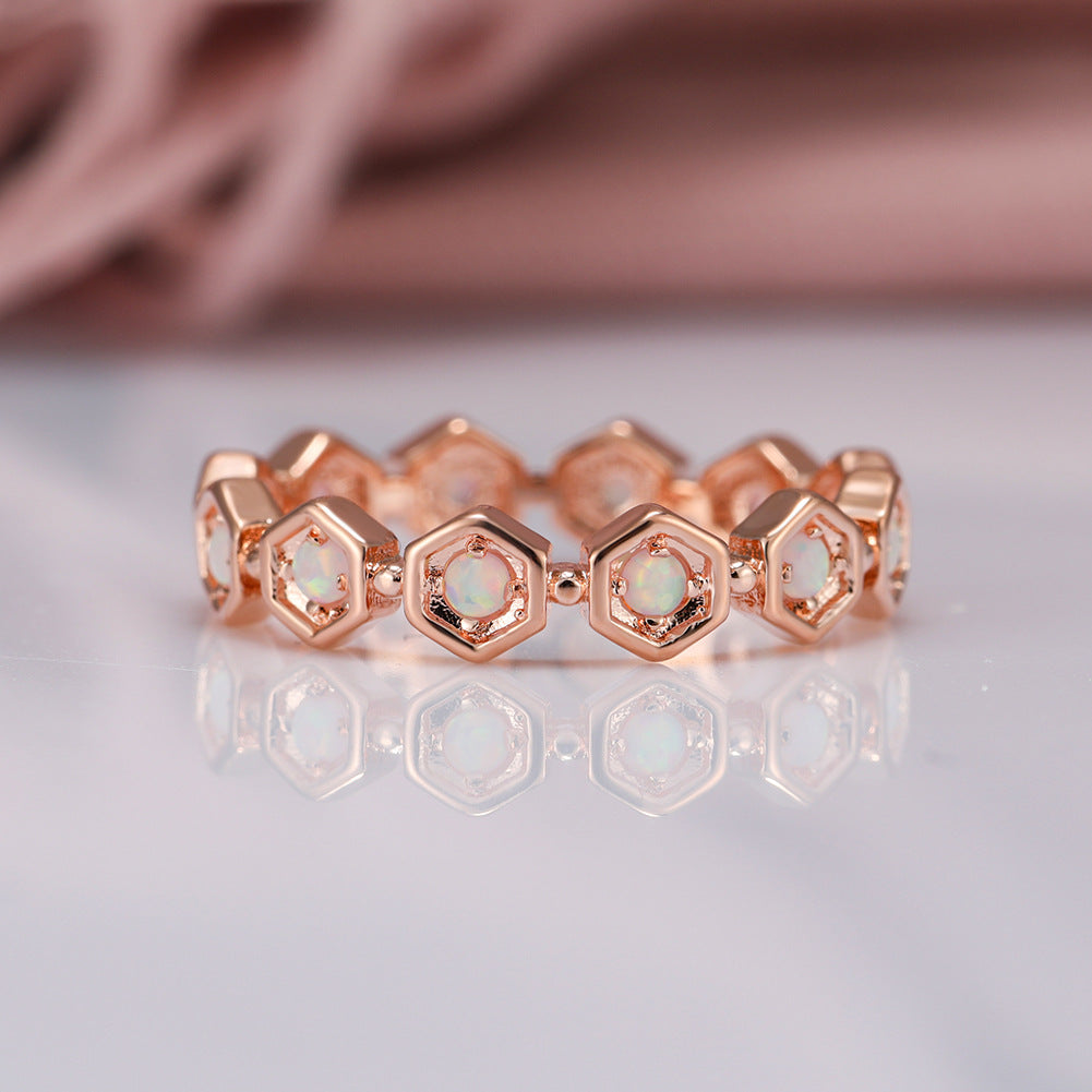 Damen Ring mit sechseckigem Design und schimmernden Opal-Einsätzen Shop Nory