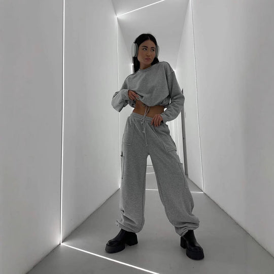 Damen kurzes Sweatshirt mit Kordelzug und Oversize-Ärmeln Shop Nory
