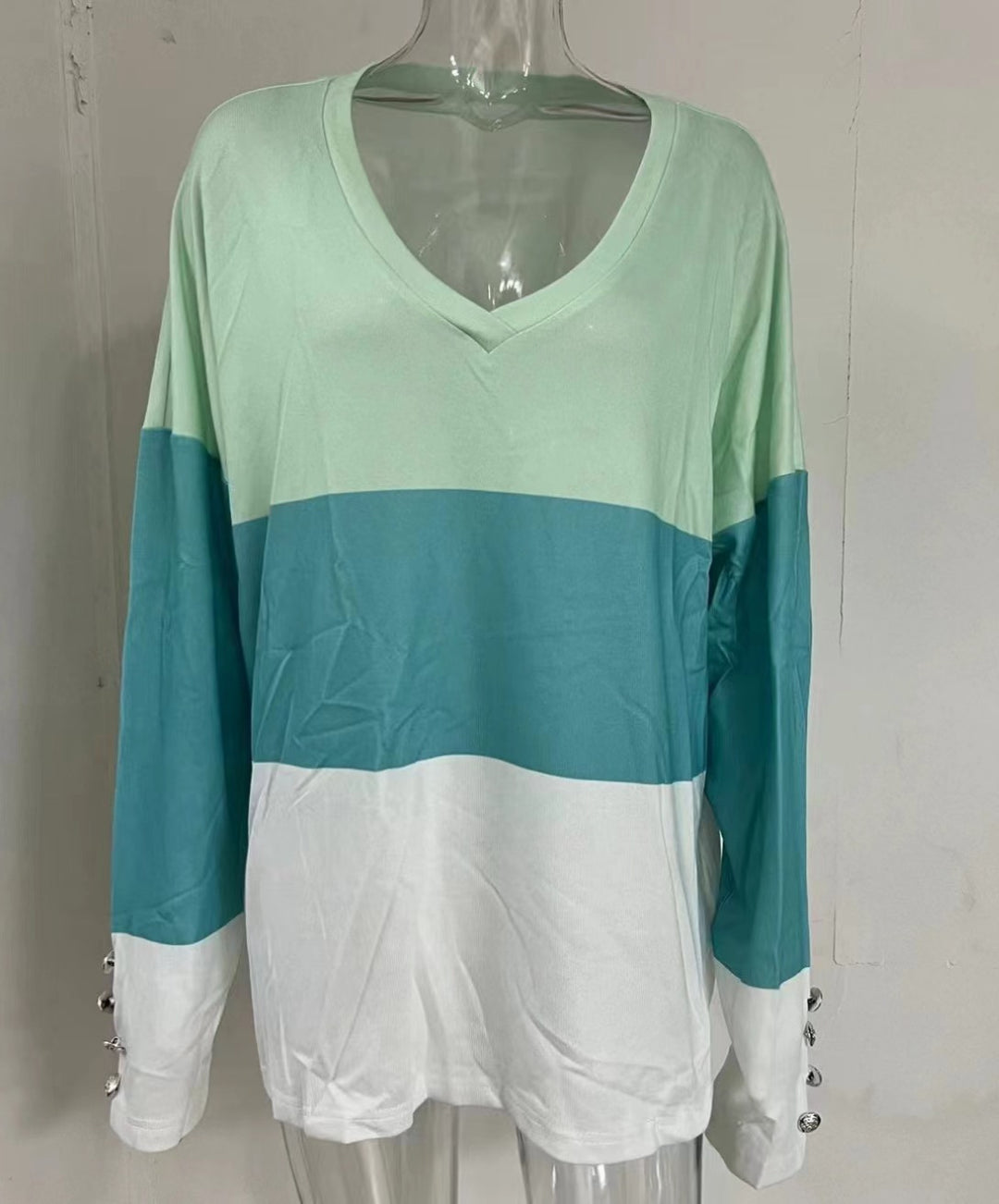 Damen Colorblock V-Ausschnitt Sweatshirt mit Zierknöpfen an den Ärmeln Shop Nory