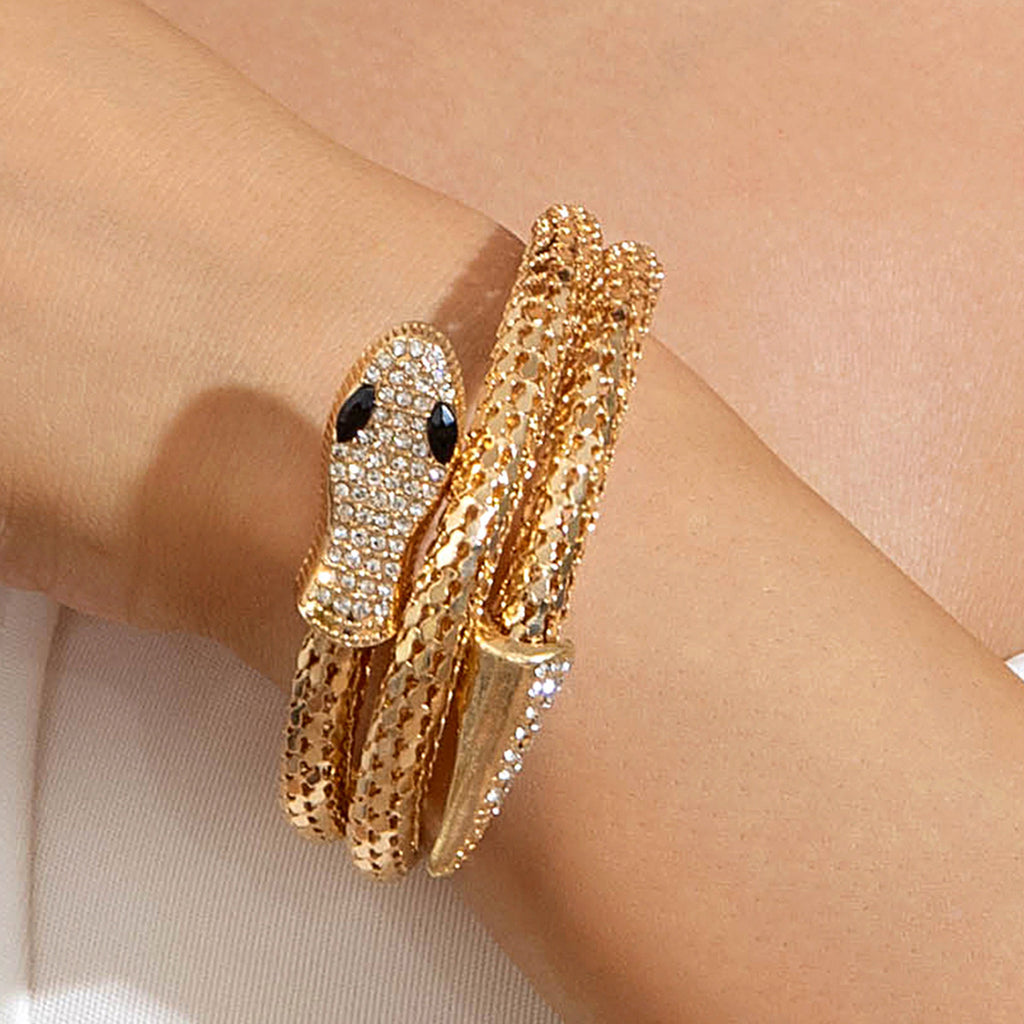 Damen Armreif im kunstvollen Schlangendesign mit funkelnden Akzenten Shop Nory