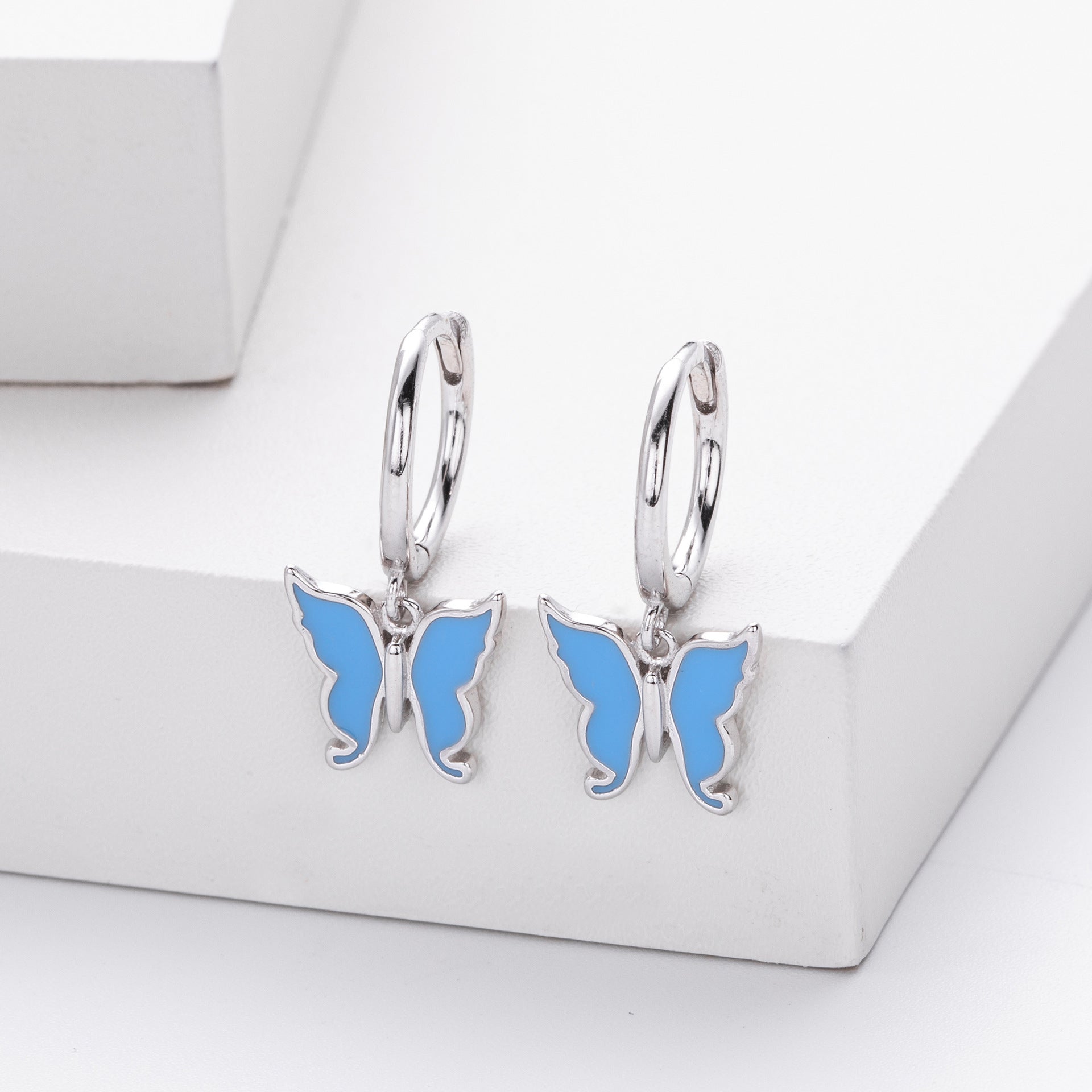 Damen Ohrringe mit schimmerndem Schmetterlingsanhänger aus 925 Sterling Silber Shop Nory