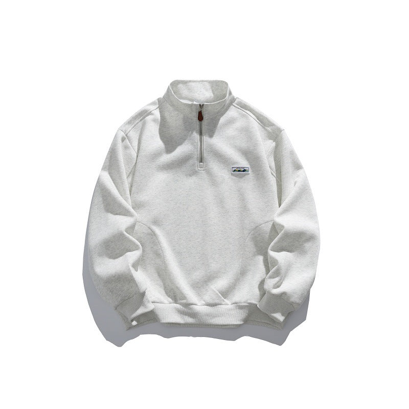Unisex Halbzip-Sweatshirt mit Stehkragen, Raglanärmeln und minimalistischer Brustpatch Shop Nory