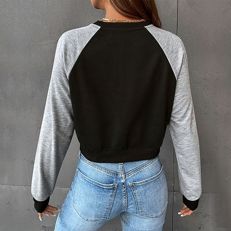 Damen Kurzschnitt-Sweatshirt mit Raglanärmeln und kontrastierenden Ärmeln Shop Nory
