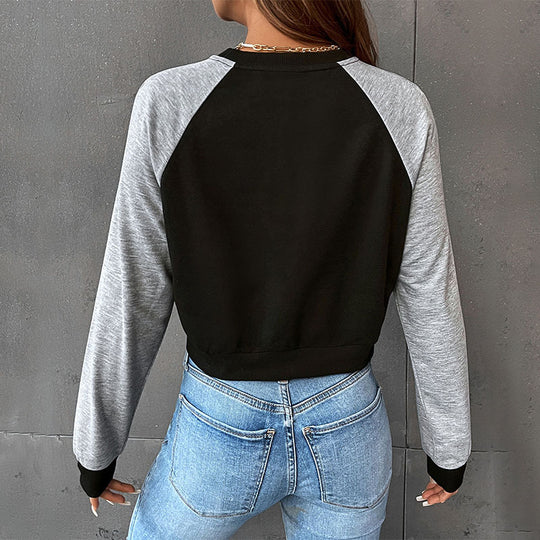 Damen Kurzschnitt-Sweatshirt mit Raglanärmeln und kontrastierenden Ärmeln Shop Nory