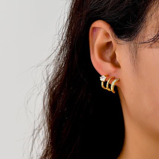 Damen Ohrhänger mit funkelnden Zirkonia-Steinen und modernem Wellen-Design Shop Nory