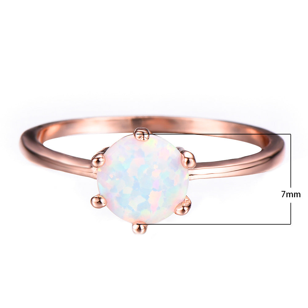 Damen Ring mit schimmerndem Opalstein in eleganter Fassung Shop Nory
