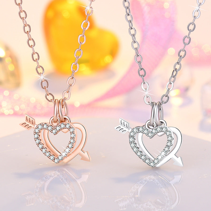 Damen Halskette mit doppeltem Herz- und Pfeilmotiv aus hochwertigem Edelstahl Shop Nory