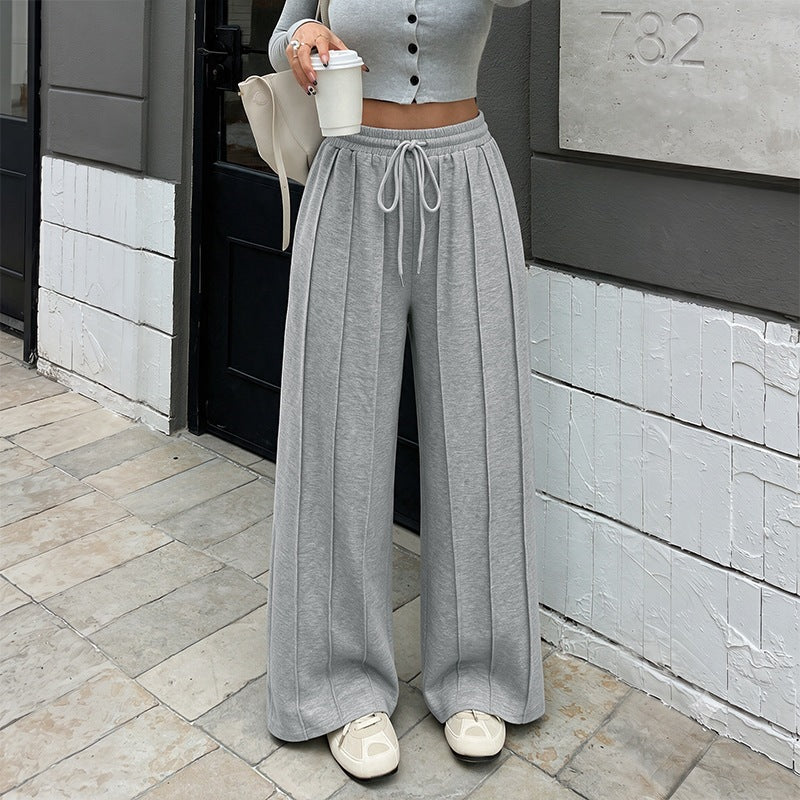 Damen Weite High‑Waist Loungewear-Hose mit Bügelfalten und Tunnelzug Shop Nory