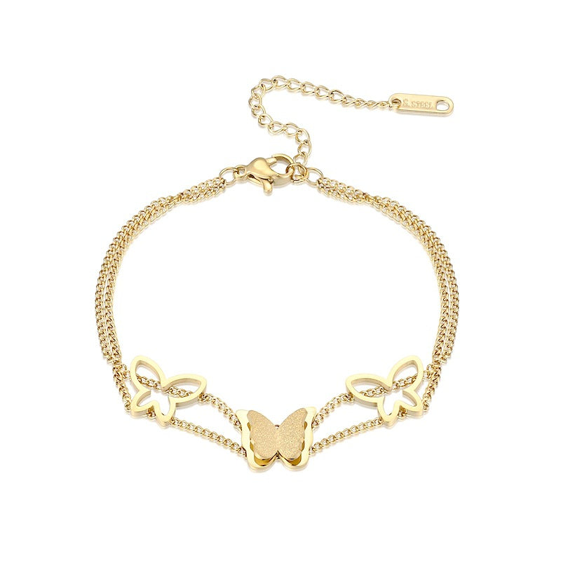 Damen Armreif mit filigranem Schmetterlingsdesign aus hochwertigem Edelstahl Shop Nory