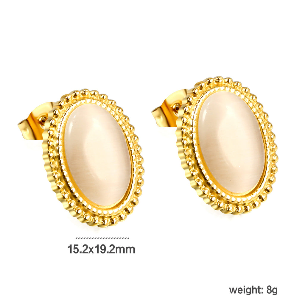 Damen Ohrstecker mit ovalem schwarzen Stein und goldfarbenem Rand Shop Nory