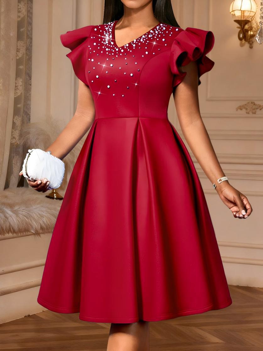 Damen A-Linien Kleid mit glitzernden Perlen und voluminösen Ärmeln