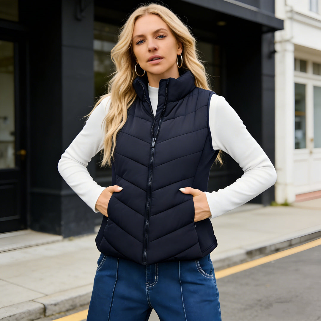 Damen Steppweste mit hohem Stehkragen und figurbetonten Stretchseiten Shop Nory