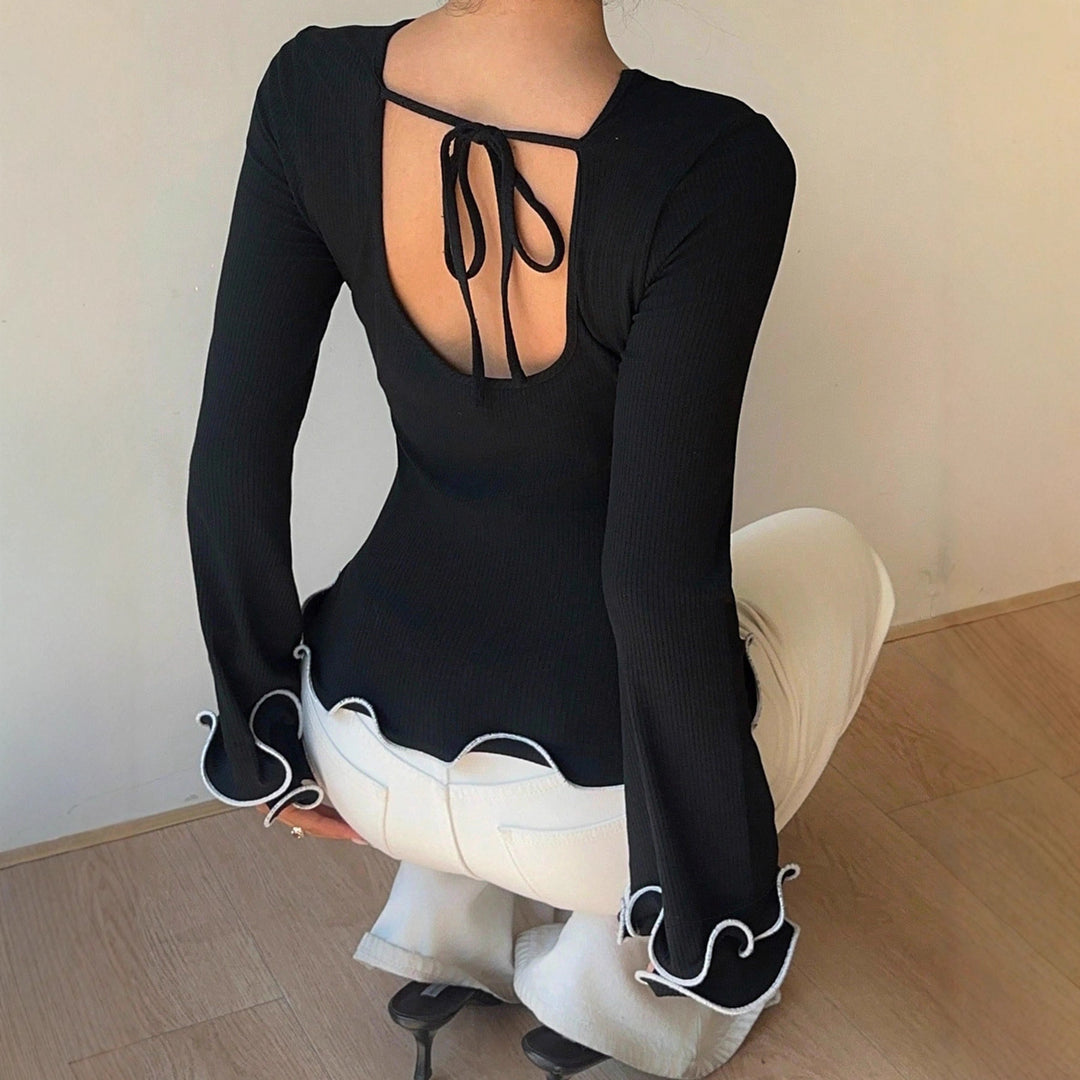 Damen Figurbetontes Langarmshirt mit Volantärmeln und welligem Saum Shop Nory