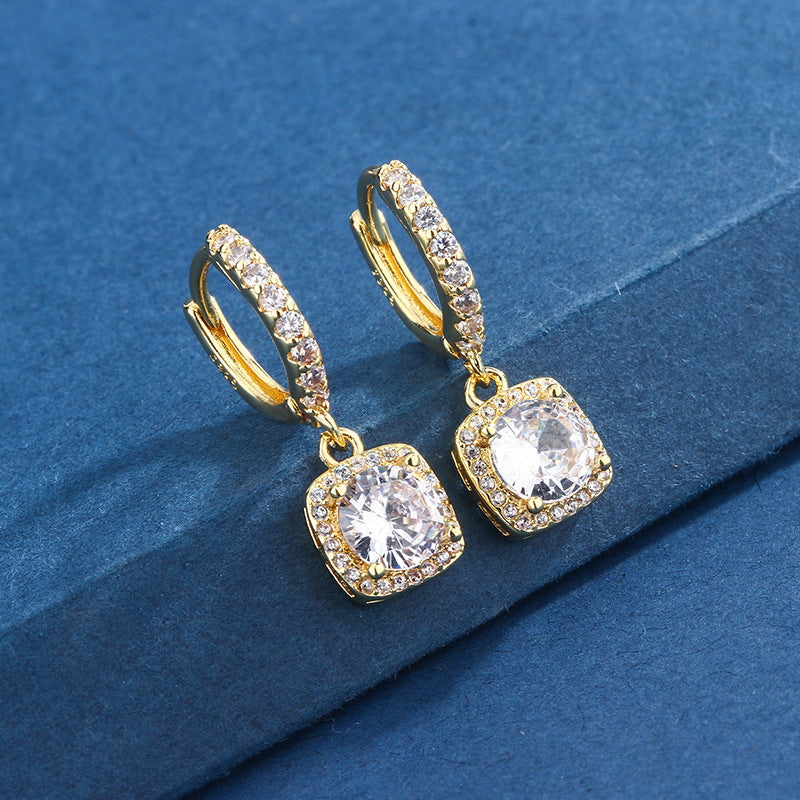Damen Elegante Ohrringe mit funkelnden Zirkonia und quadratischen Anhängern Shop Nory