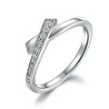 Damenring mit elegantem Kreuzdesign und funkelnden Zirkonia Shop Nory