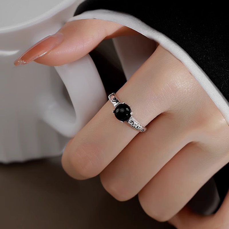 Damen filigraner Ring mit elegantem Onyx und kunstvoller Fassung Shop Nory