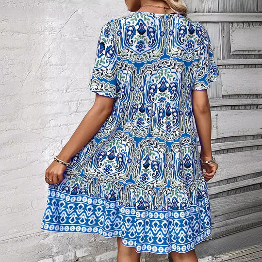 Damen Lockeres Stufen‑Midikleid mit V‑Ausschnitt, Quastenbindeband und Boho‑Print Shop Nory